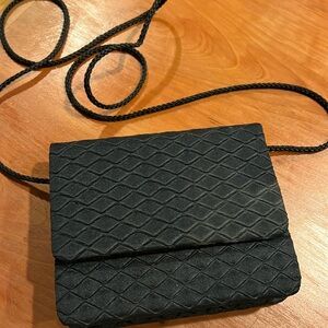 Silky textured 4 x 1” black clutch/purse